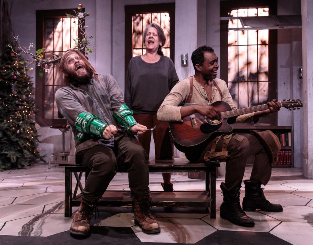 Hunter (James Creque), Sharon (K Jenny Jones), and Herbie (Ben Dudley) practice a song for the festival during the premiere of Bankers at Know Theatre. Photo by Dan R Winters.