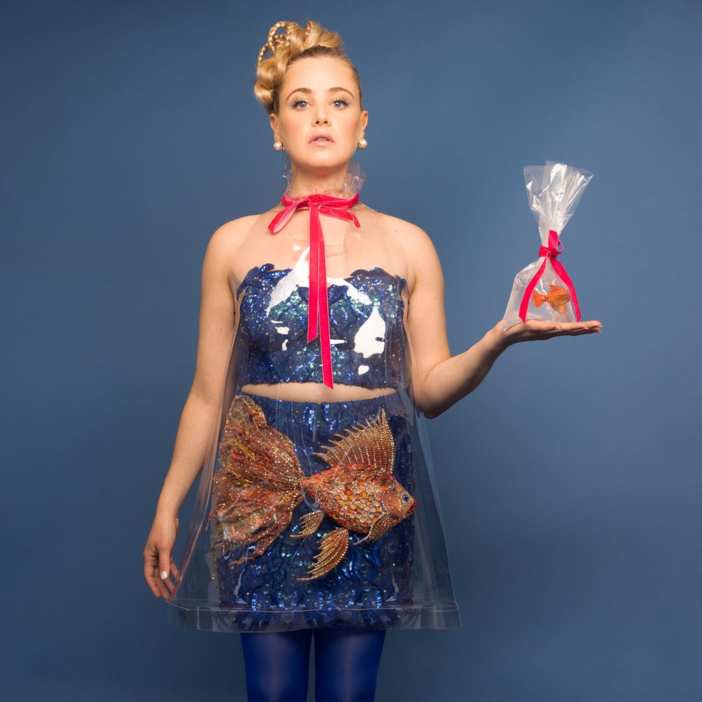 Liz Toonkel in Magic for Animals--hold and wearing goldfish